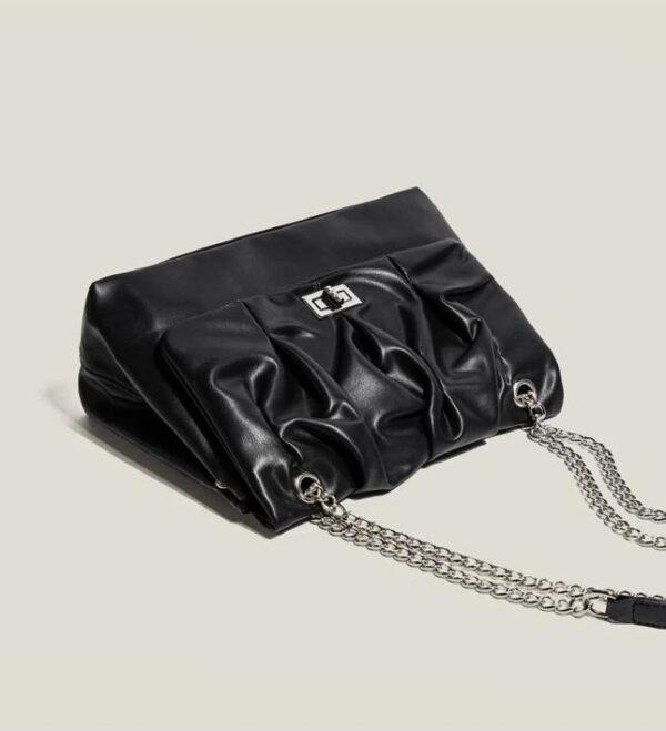 732bd01b-a82a-4b58-95e0-235a540f24dc The Midnight Gilded Satchel